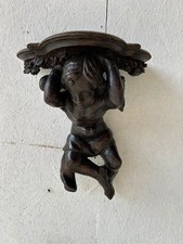 mensola in legno scolpito