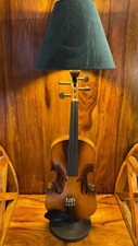 Lampada per violino 