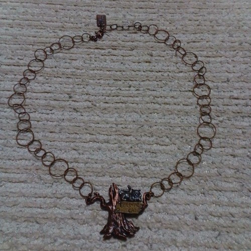 Collana gatto tronco albero