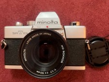 Minolta SRT 101b con obiettivo
