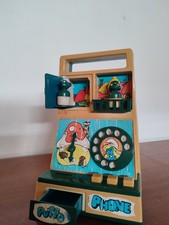 Casa con telefono puffi - con,