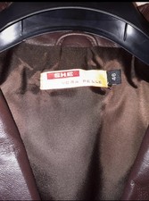 cappotto lungo in vera pelle marrone, nuovo.