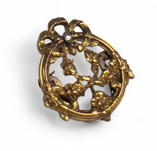 Spilla clip corsetto nastro