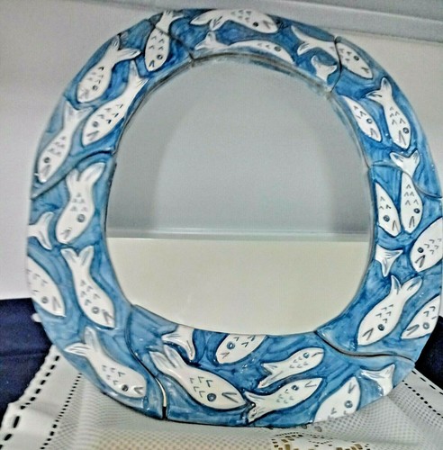Cornice con specchio ovale