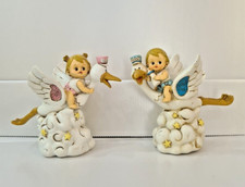 set 2 salvadanai resina cicogna con bimbi cm 15 x 12