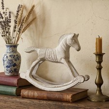 Cavallo dondolo ghisa - a,