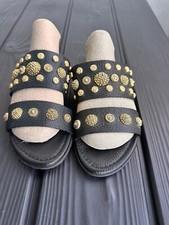 Zoccoli neri in pelle