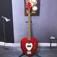 basso elettrico personalizzato di fabbrica 4 corde metallo colore rosso a forma di udito