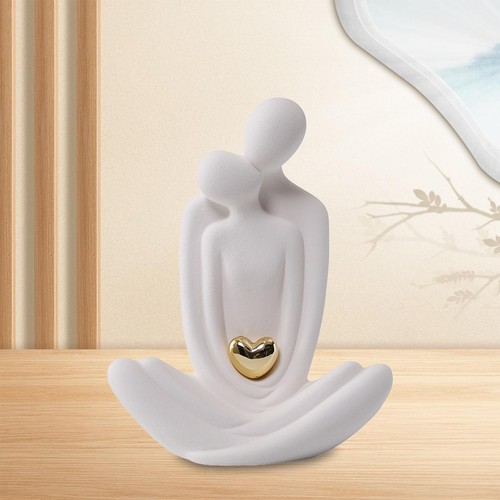 Statua ceramica coppia - in,