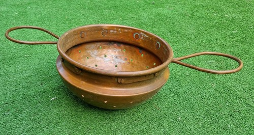 Antico pentolino scolapasta
