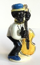 Bottiglietta vintage liquore Certosa Marmaca bassista jazz nero con contrabbasso