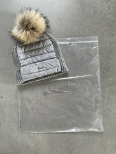 Cuffia Herno con pompon in pelliccia