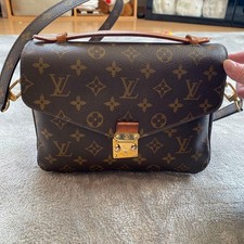 Autentica Pochette Louis