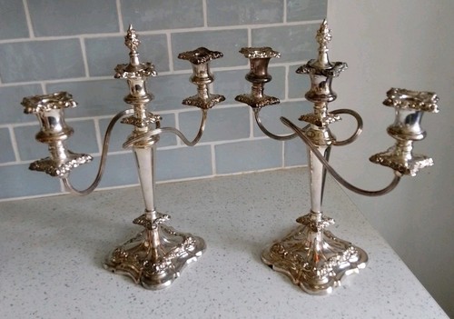 Coppia candelabri piatti - di,