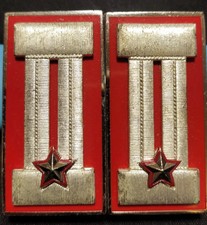 PAIR OF ALAMARI MILITARY SIGNS