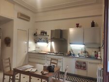 Cucina usata Gaggenau di colore bianco con piano di lavoro in acciaio inox