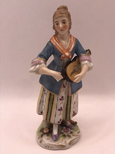 Antica statuina porcellana