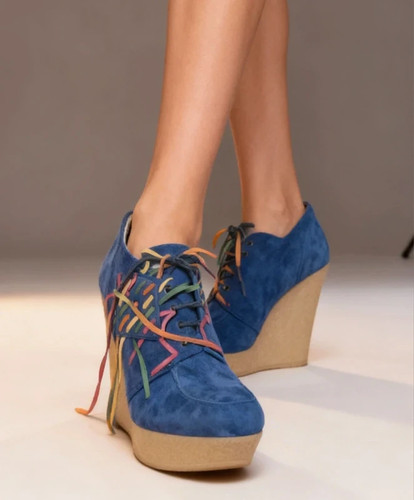 Scarpe zeppa alta pelle
