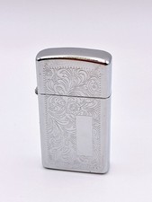 Accendino ZIPPO slim argento modello arabesco veneziano usato