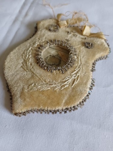 Antique velvet beaded - , shield