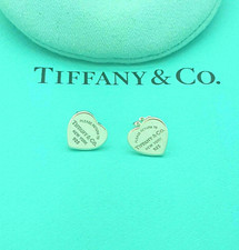 Orecchini a perno Return to