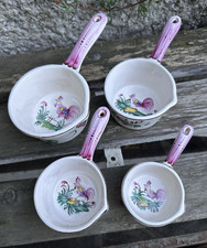 Vecchio set di pentolini in