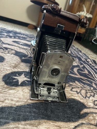 Brown polaroid land - , camera