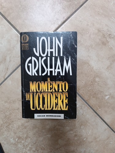 John grisham momento di - grisham,