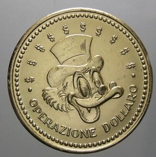MONETA GETTONE TOPOLINO 1969 PAPERONE OPERAZIONE DOLLARO IN PLASTICA DORATA