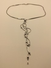 Girocollo in argento con elementi pendenti e rompitratta ovoidali ag 925