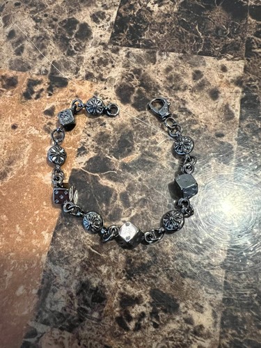 Bracciale croce dadi cuori
