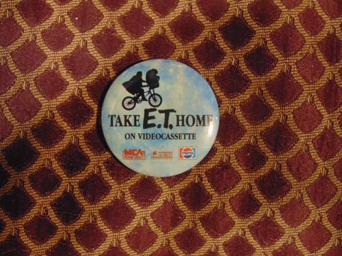 Take pulsante a spilla - take, e.t.