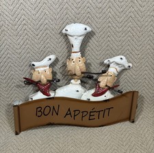 Insegna da parete in metallo