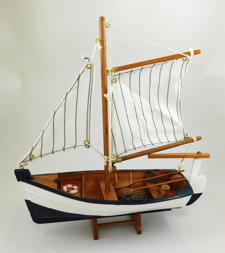 Model sailing boat with oars - sailing,