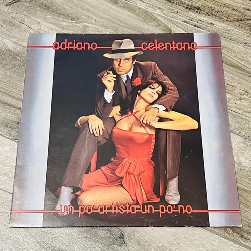 Giri adriano celentano un - 33,