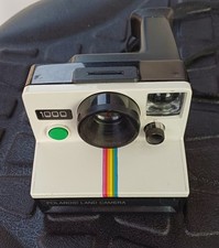 POLAROID  Supercolor  CAMERA 1000 non testata, piu' 7 confezioni di pellicole   
