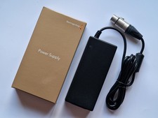 Alimentatore per fotocamera