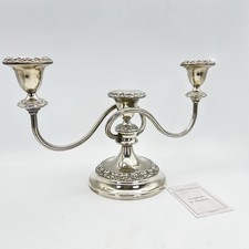 Candelabro antico in argento