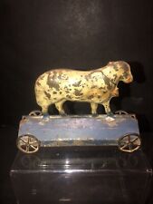 Raro giocattolo vintage antico 1890 agnello americano latta piattaforma pull