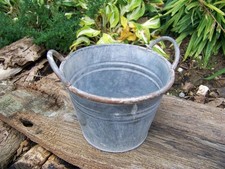 Fioriera in zinco sopravaso