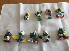 Lotto di 9 puffi  e puffette -