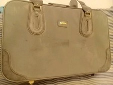 CARLTON INTERNATIONAL VALIGIA VINTAGE - UN MANICO - UNA CHIUSURA A ZIP - 4 RUOTE