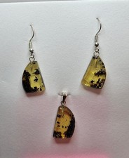 Set orecchini e pendenti a