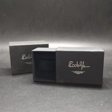 Cofanetto nero per orologio Longines Rodolphe con sbiaditura e segni esteriori