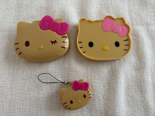 Hello kitty suntanned - hello,