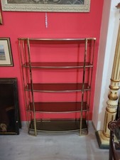 Etagère in metallo dorato e