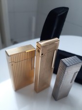 Tris accendini oro e argento colibri e flaminare