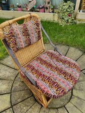 Antica sedia pieghevole metà