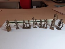 Lotto  7 statuette in ottone