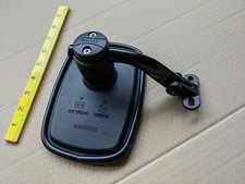 Specchio universale e tuta